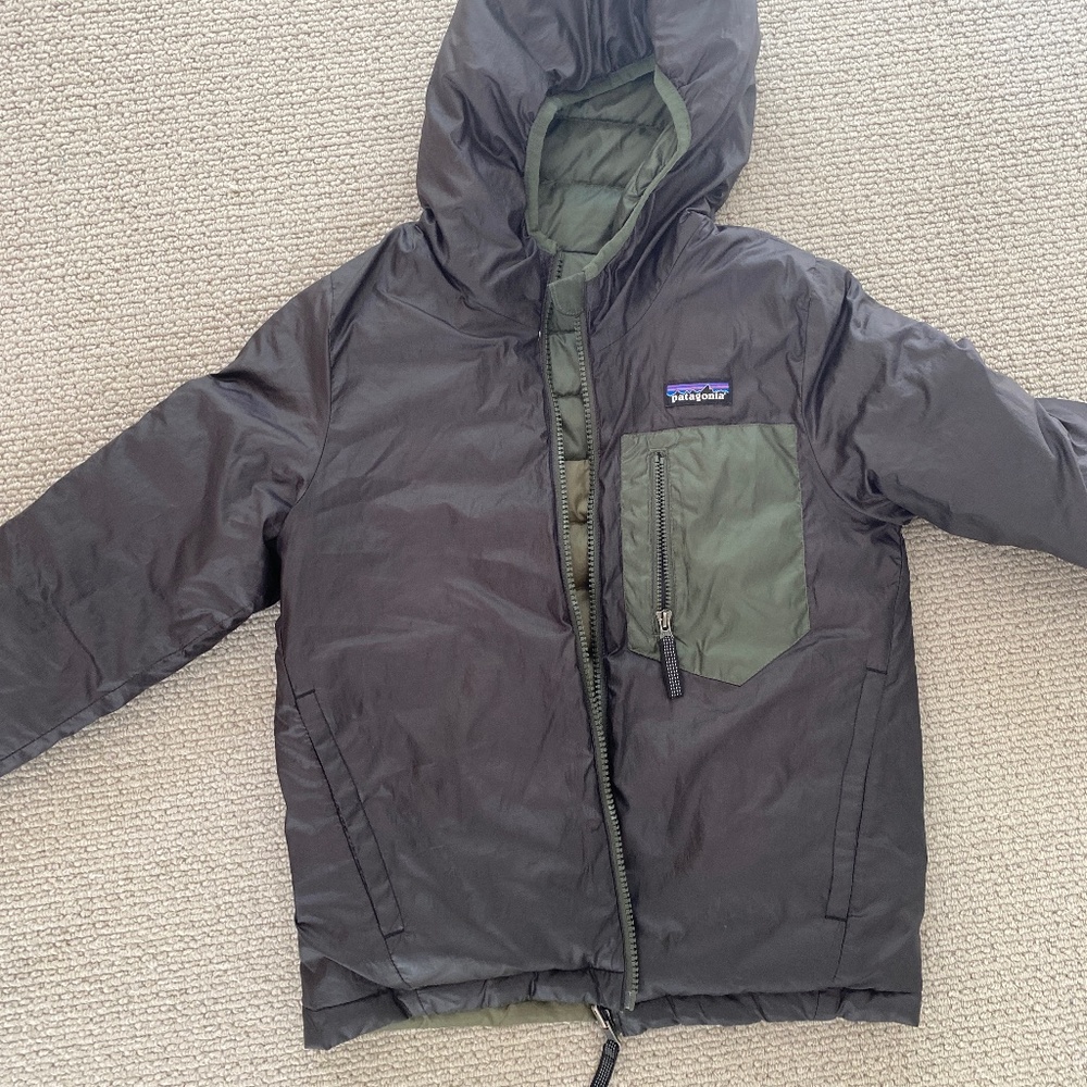 Who is reversible, hooded Patagonia jacket in army green?